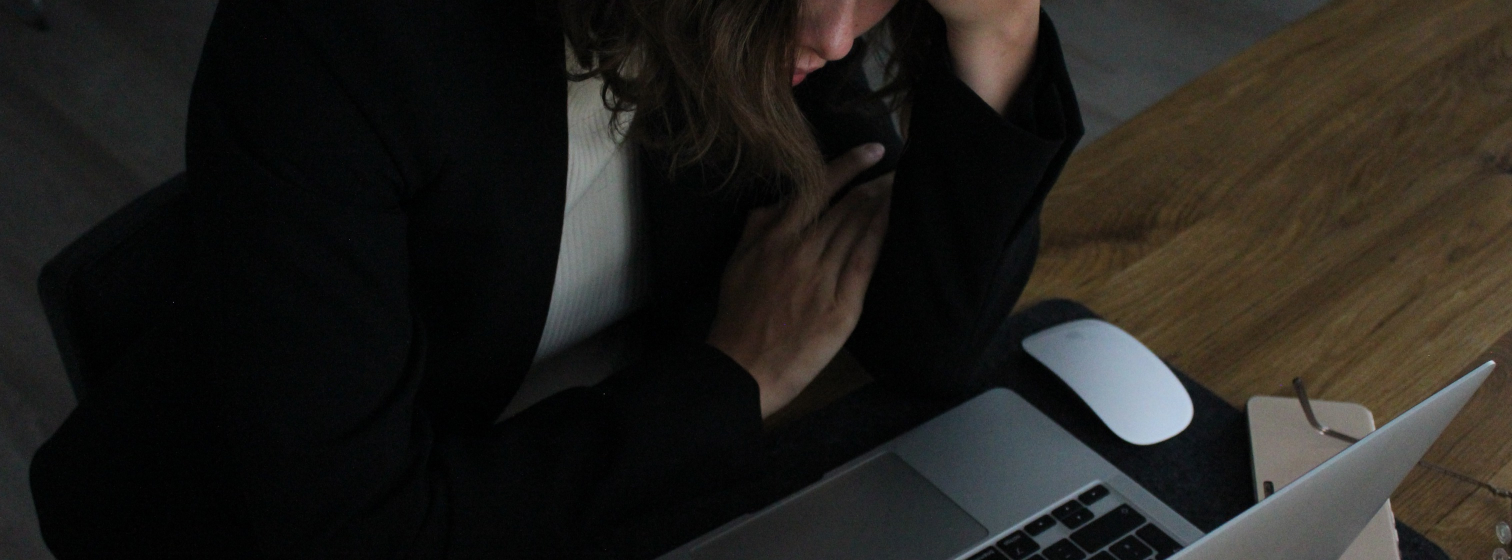 Girl looking at her laptop