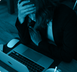 Girl looking at her laptop
